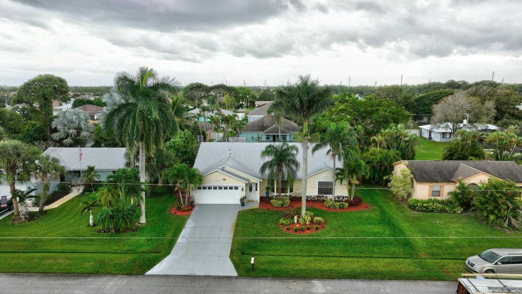 Photo of 2332 SE Gillette Avenue, Port Saint Lucie, FL 34952 (MLS # R10941665)