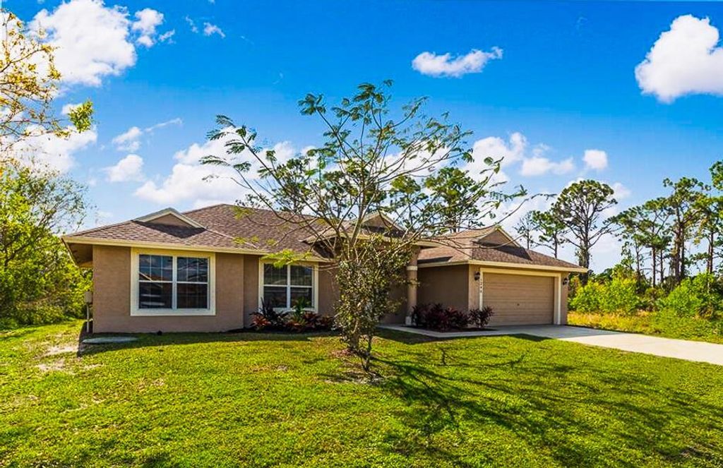 Photo of 1246 SW Santiago Avenue, Port St Lucie, FL 34953 (MLS # R10890516)