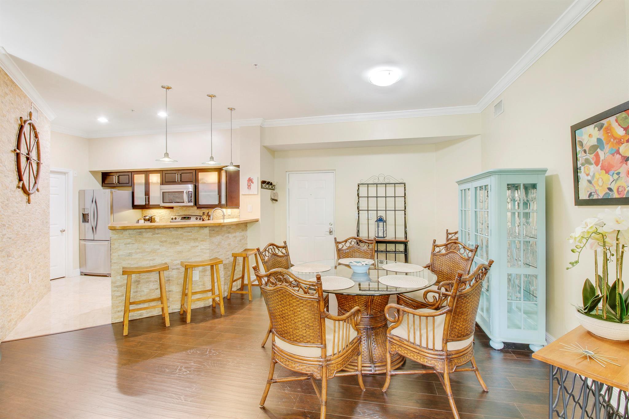 Fully Renovated & fully furnished/turnkey condo that can be rented out immediately & up to 12 times per year! Located in the highly sought after St. Andrews at Polo Club & just minutes from the WEF Showgrounds. Upgrades include butcher block counter tops in the kitchen, stainless appliances, crown molding throughout, NO carpet, updated lighting, tile in the kitchen & bathrooms, both bathrooms fully renovated, built-in's in both walk-in closets, stone accent walls, high ceilings, and so much more! This condo is also being sold fully furnished and fully equipped/turnkey. It is move in ready or it is ready to be rented out immediately! Great as an Equestrian Rental!
