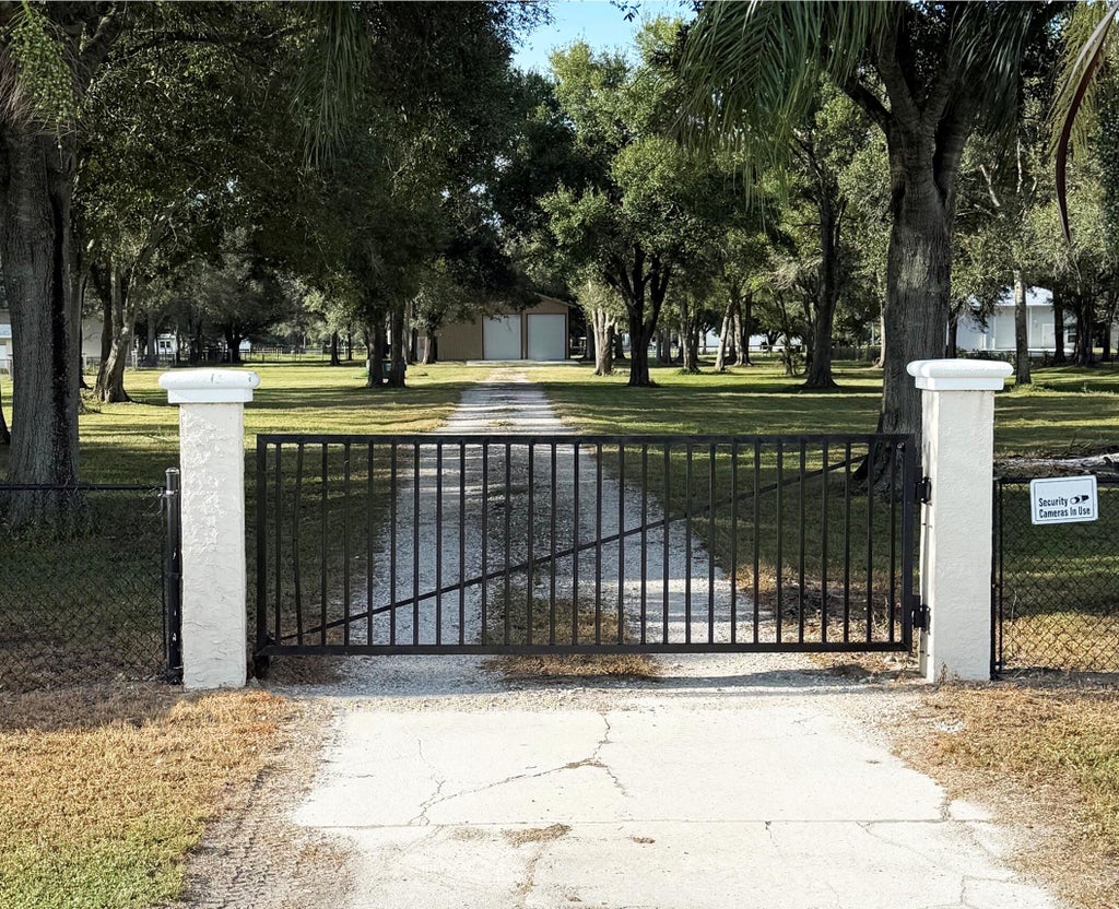 Photo of 11980 W Midway Road, Fort Pierce, FL 34945 (MLS # B26077050)