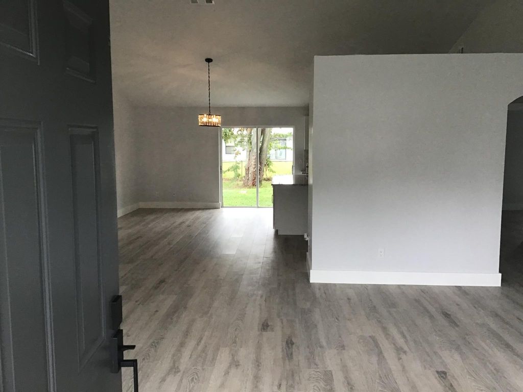 Photo of 4025 SW Hablow Street, Port Saint Lucie, FL 34953 (MLS # R10952803)