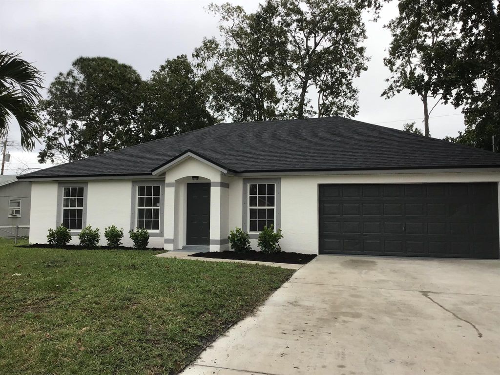 Photo of 4025 SW Hablow Street, Port Saint Lucie, FL 34953 (MLS # R10952803)