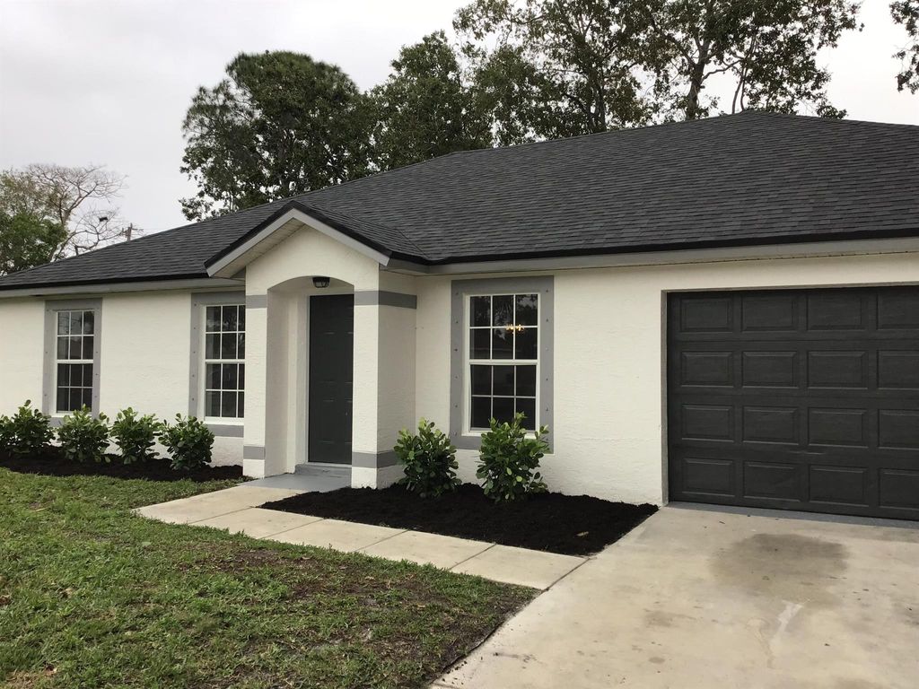 Photo of 4025 SW Hablow Street, Port Saint Lucie, FL 34953 (MLS # R10952803)