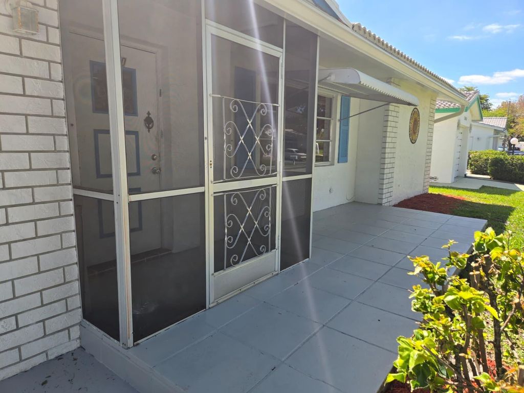 Photo of 1050 NW 90th Way, Plantation, FL 33322 (MLS # B26008691)