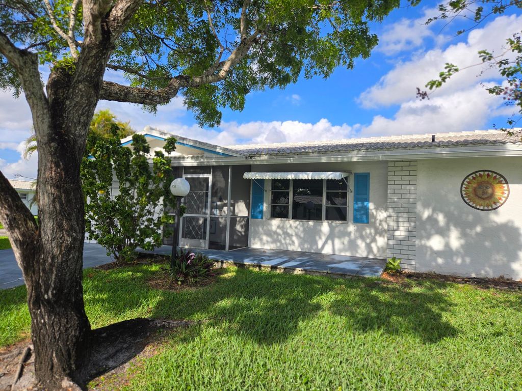 Photo of 1050 NW 90th Way, Plantation, FL 33322 (MLS # B26008691)