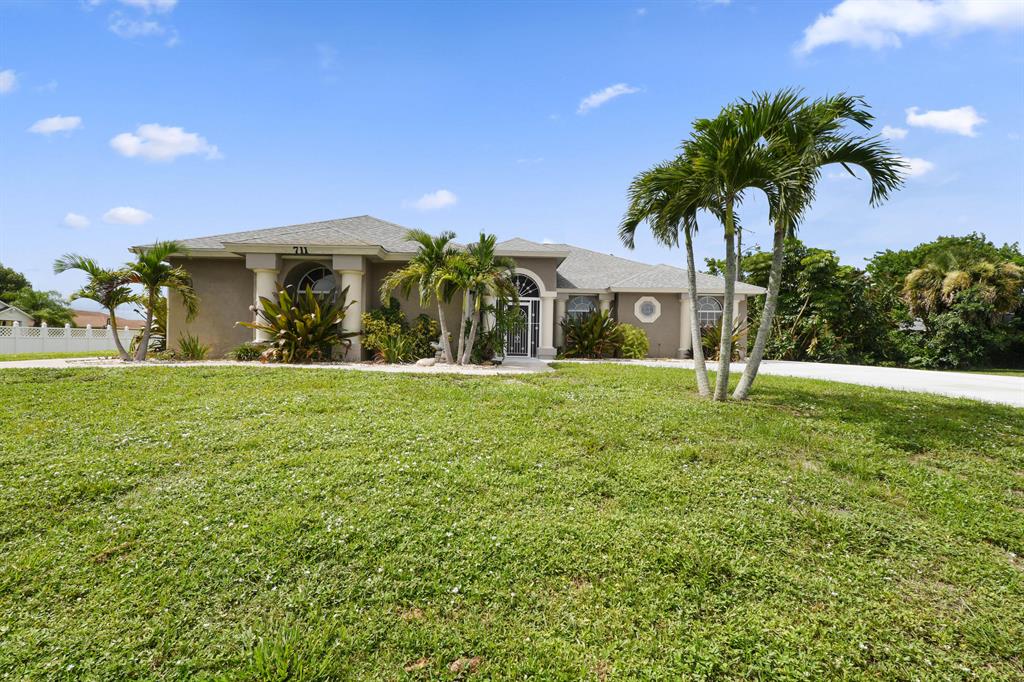 Photo of 711 SW Gretchen Terrace, Port Saint Lucie, FL 34953 (MLS # R10736839)