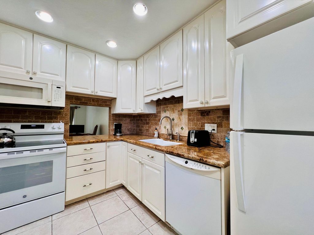 Photo of 150 Lake Meryl Drive #247, West Palm Beach, FL 33411 (MLS # R11160818)