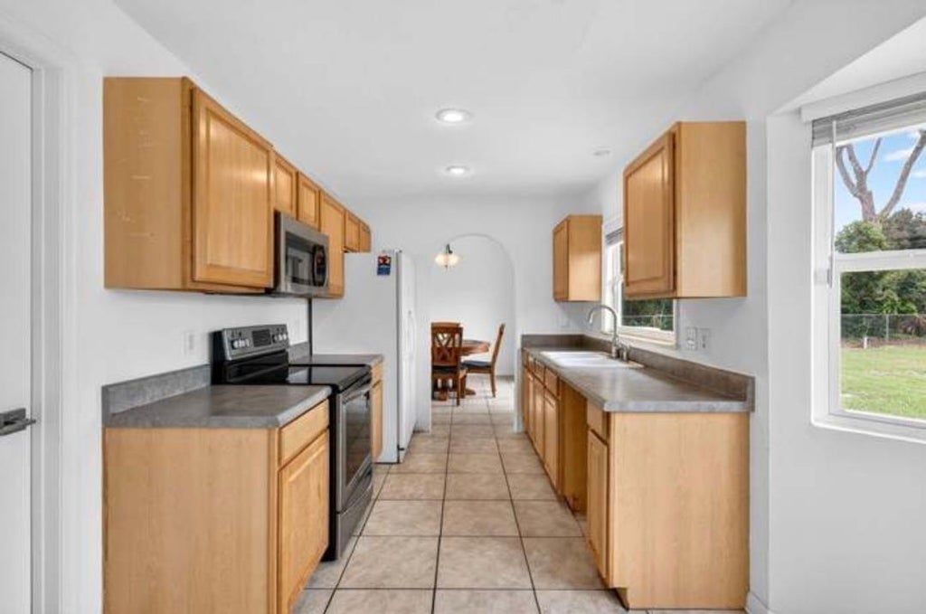 Photo of 2291 SW FRANKLIN Street, Port Saint Lucie, FL 34953 (MLS # B26080952)