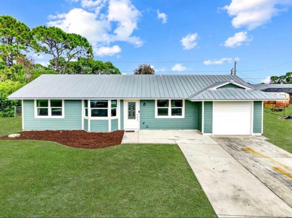 Photo of 2291 SW FRANKLIN Street, Port Saint Lucie, FL 34953 (MLS # B26080952)