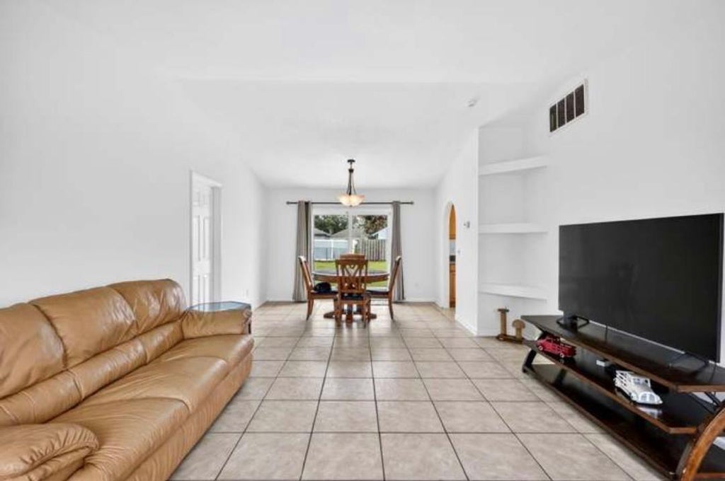 Photo of 2291 SW FRANKLIN Street, Port Saint Lucie, FL 34953 (MLS # B26080952)