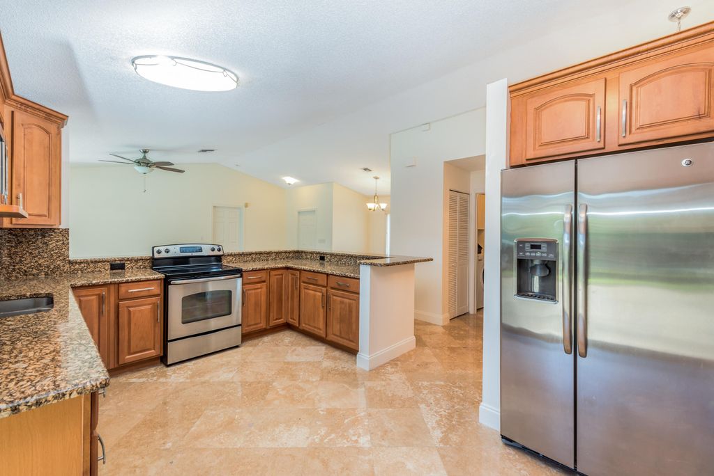 Photo of 5514 NW 41st Terrace, Coconut Creek, FL 33073 (MLS # B26034669)