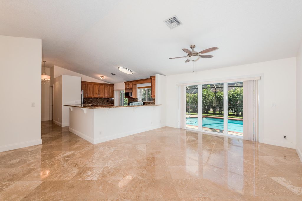 Photo of 5514 NW 41st Terrace, Coconut Creek, FL 33073 (MLS # B26034669)