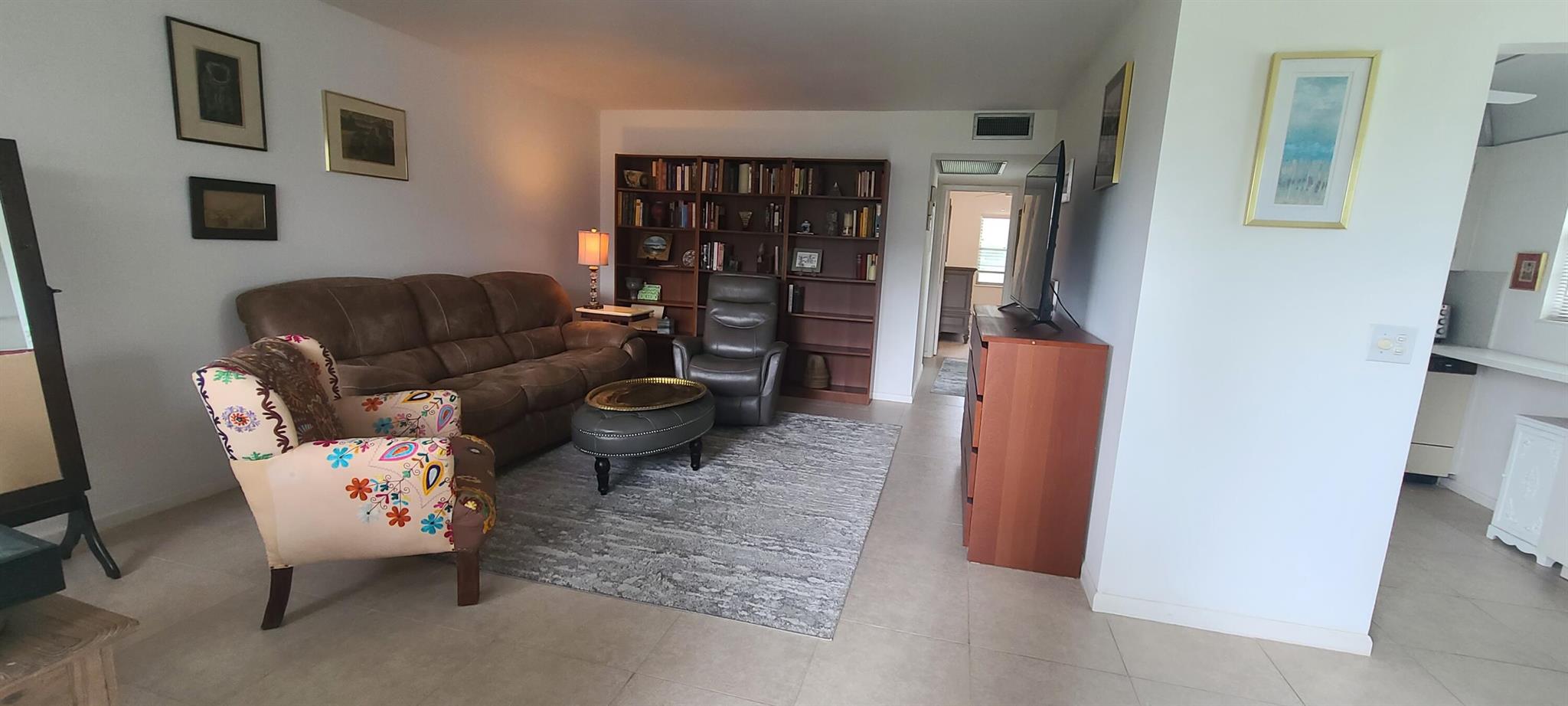 Elegant, classy and beautifully maintained 2-bedroom, 2-bath condo in the desirable Suffolk at Century Village, Boca Raton. Located on the 2nd floor in a quiet, well-kept neighborhood, this residence is sold fully furnished and move-in ready. Enjoy a bright, spacious layout with serene garden views. Experience premier 55+ resort-style living with clubhouse, theater, pools, fitness center, tennis, and courtesy shuttles. Conveniently close to shopping, dining, places of worship, and the Florida Turnpike -- perfect for seasonal or year-round luxury living.