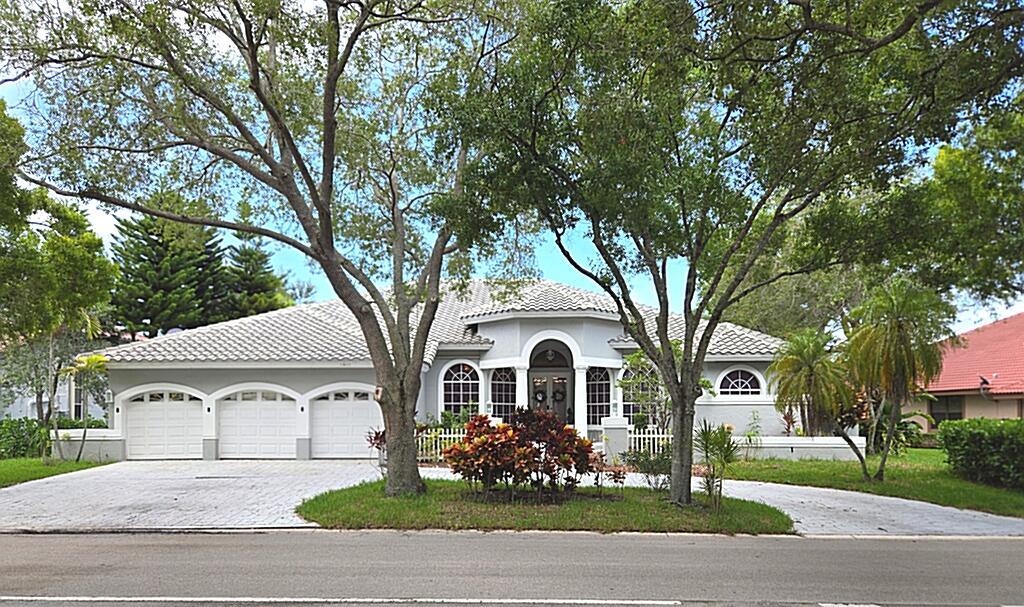 Stunning Remodeled Home in Prestigious Eagle Trace!Welcome to luxury living. This beautifully remodeled residence boasts 4 spacious bedrooms, a private den, 3 elegant bathrooms, and a 3-car garage, offering over 3,429 sq. ft. under air and 4,509 total sq. ft. of refined comfort.Step inside to discover gleaming white marble floors throughout the main living areas, creating a bright and sophisticated atmosphere. The gourmet kitchen is a chef's dream, featuring premium appliances and sleek Italian cabinetry that seamlessly blends form and function.Enjoy seamless indoor-outdoor living with a stunning marble pool patio deck, perfect for relaxing or entertaining in style.Located in a quiet, secure community with low HOA fees, this home offers access to optional golf memberships