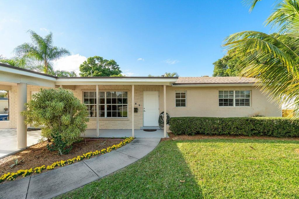 Photo of 323 Flagler Boulevard Blvd, Lake Park, FL 33403 (MLS # R10776721)