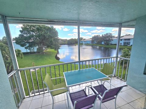 Photo of 1105 SW Swan Lake Circle #103, Port Saint Lucie, FL 34986 (MLS # R11132377)