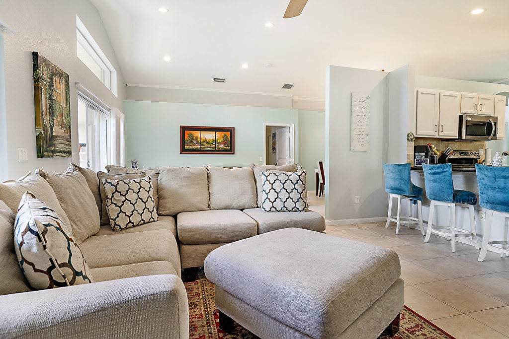 Photo of 5028 Solar Point Drive, Greenacres, FL 33463 (MLS # R11165453)