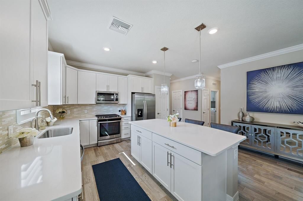 Photo of 827 SE Villandry Way Way, Port Saint Lucie, FL 34984 (MLS # R10814048)