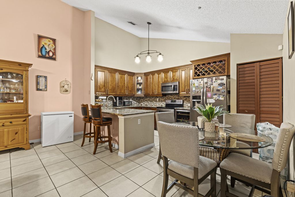Photo of 1175 Shibumy Circle #A, West Palm Beach, FL 33415 (MLS # R11129459)