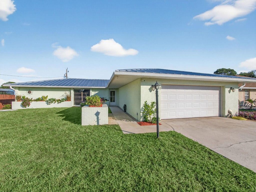 Photo of 133 NW Avens Street, Port Saint Lucie, FL 34983 (MLS # F10540859)