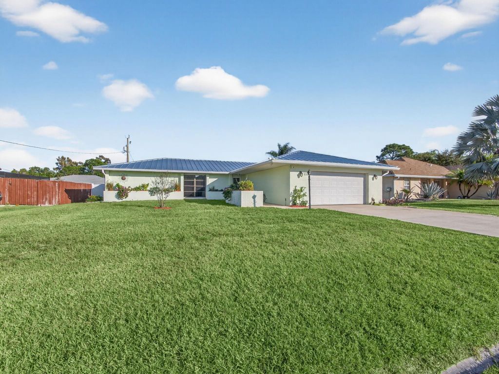 Photo of 133 NW Avens St, Port Saint Lucie, FL 34983 (MLS # F10540859)