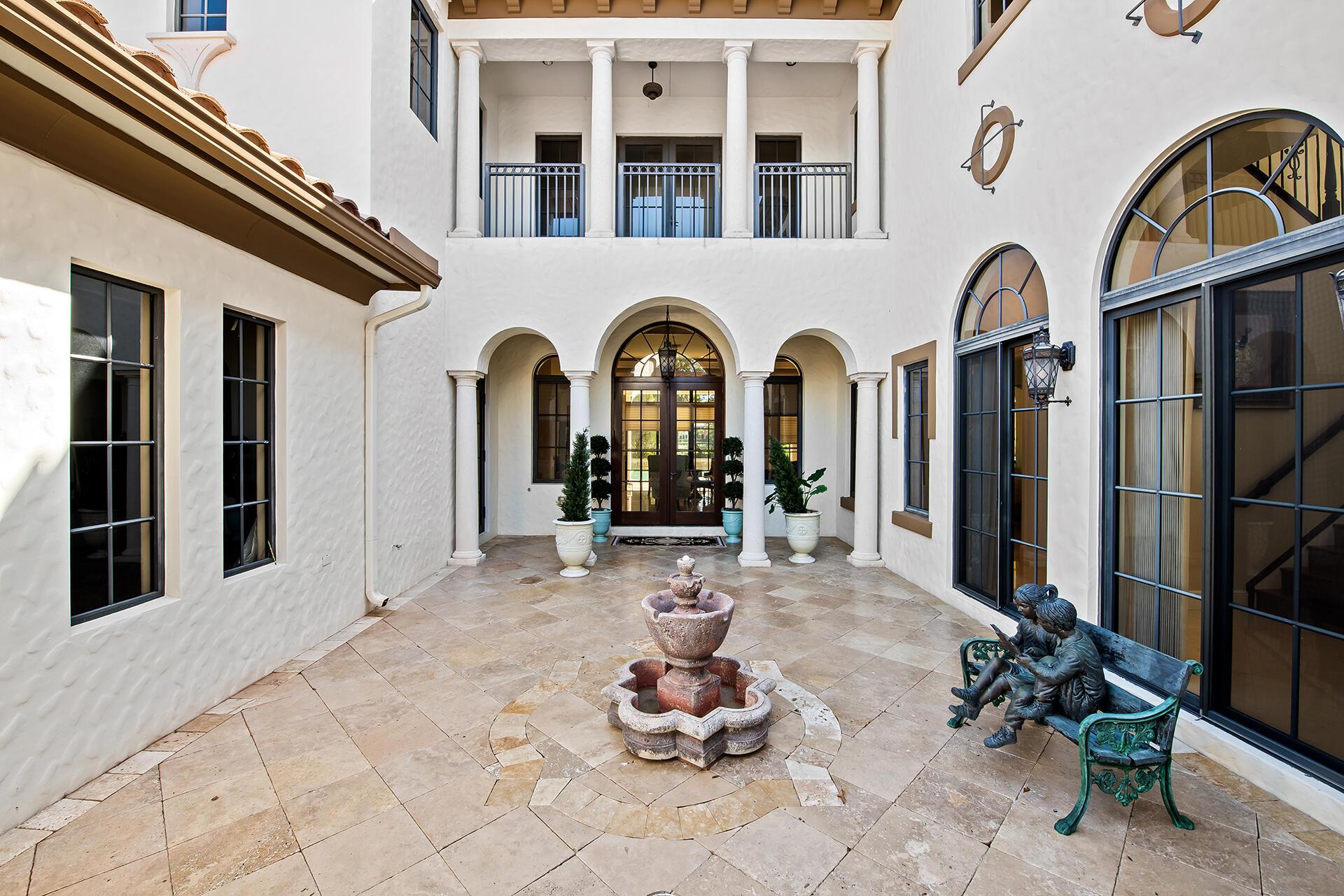 Well-appointed 2-story Prado model in the Gables Estates, with fantastic golf and water views. All impact windows & doors, and CBS construction includes 2nd floor. This Tuscan inspired home has 5 Bed, 4.5 baths and 3-car garage and is located on one of the most sought-after streets in Parkland Golf, with large lots and great views. Soaring ceilings, crown moldings, solid core doors, and many architectural details. 1st floor features a downstairs guest suite with sitting area. There is plenty of space to entertain in the formal living room, formal dining room, and family room. Plus, an oversized courtyard complete with fireplace. The spacious kitchen has abundant cabinets and counter space, double wall oven, and views of the 20 x 40 saltwater heated pool