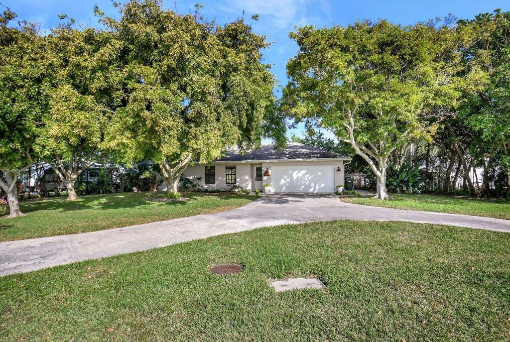Photo of 597 Curlew Road, Delray Beach, FL 33444 (MLS # R11054015)