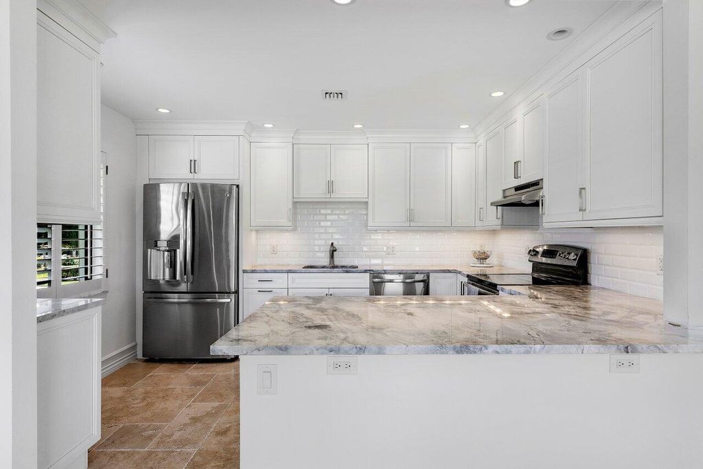 Photo of 3736 Quail Ridge Drive #Green Heron S, Boynton Beach, FL 33436 (MLS # R10957616)