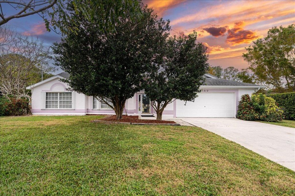 Photo of 1212 SE Petunia Avenue, Port Saint Lucie, FL 34952 (MLS # R11066587)