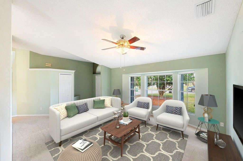 Photo of 1212 SE Petunia Avenue, Port Saint Lucie, FL 34952 (MLS # R11066587)