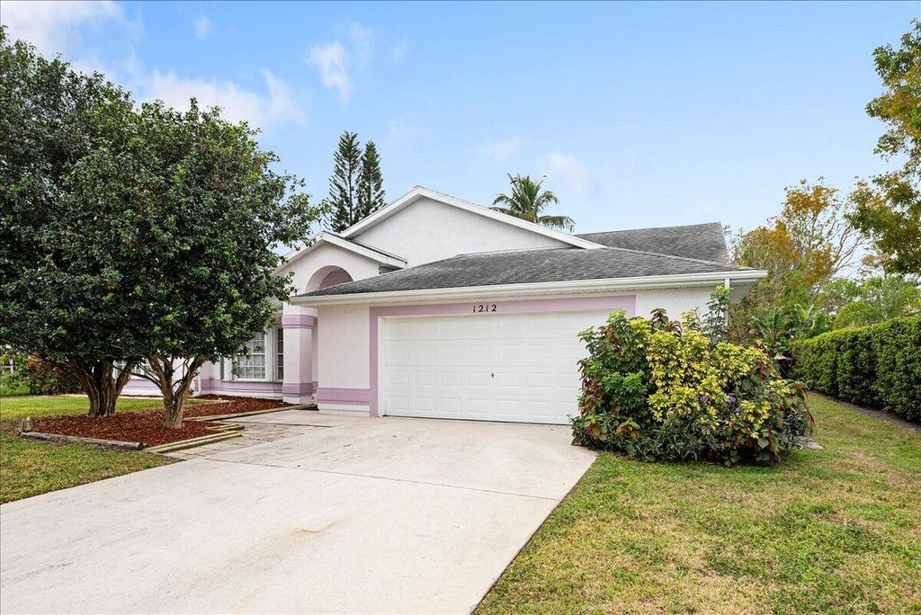 Photo of 1212 SE Petunia Avenue, Port Saint Lucie, FL 34952 (MLS # R11066587)