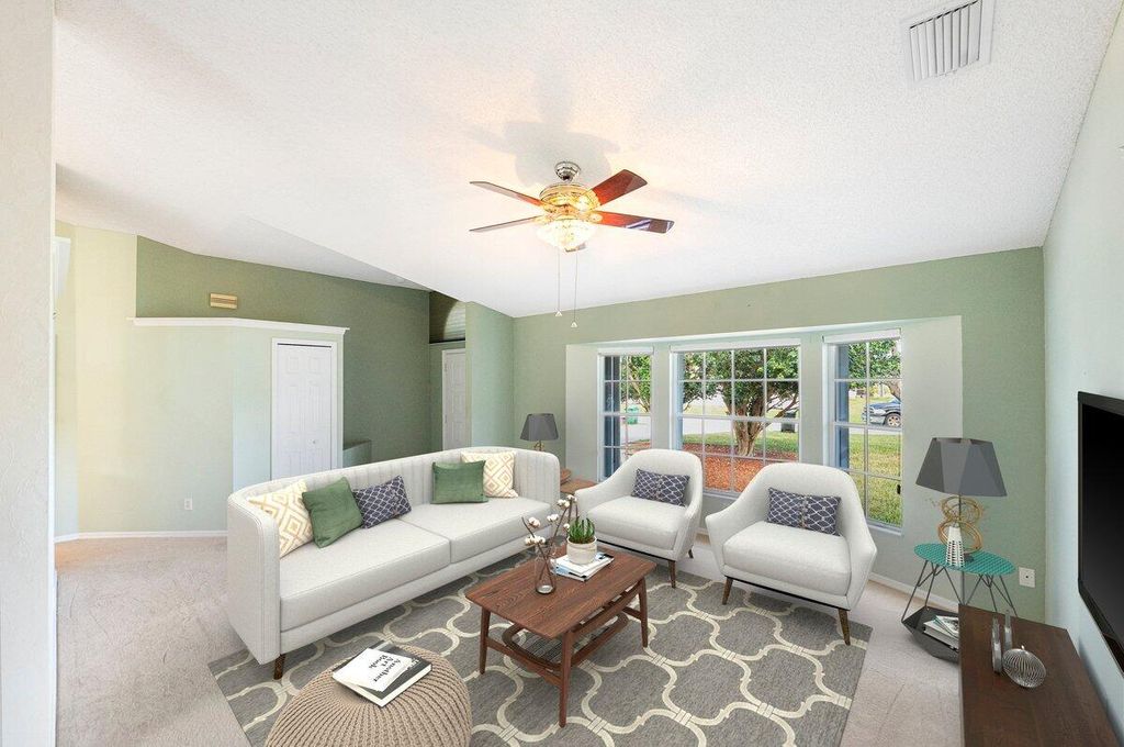 Photo of 1212 SE Petunia Avenue, Port Saint Lucie, FL 34952 (MLS # R11066587)