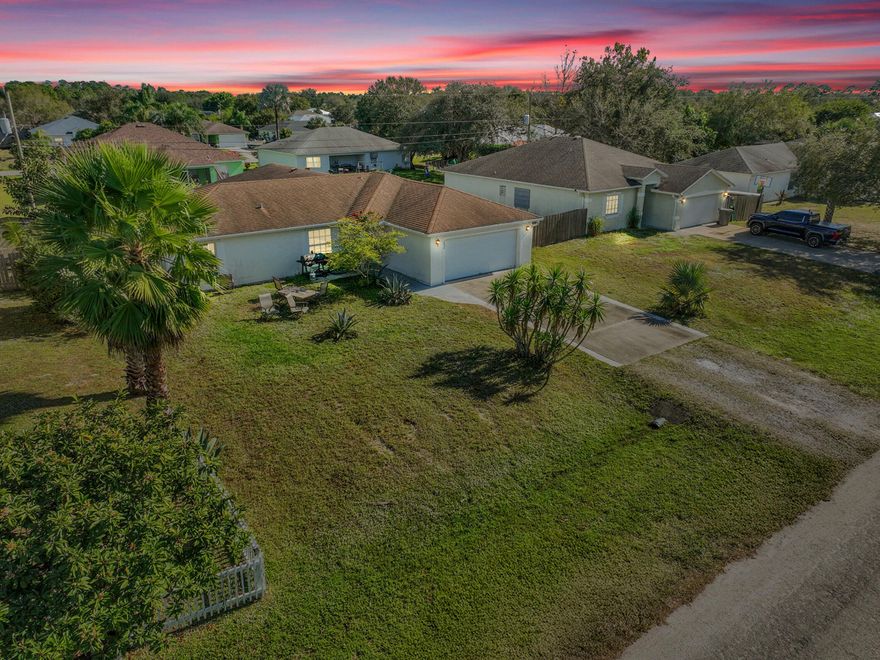 Welcome to this charming 3-bedroom, 2.5-bath split-plan home in desirable Vero Lake Estates. This home is minutes away from beaches, dining, and riverfront attractions. Major updates include a brand new roof and newly installed fence, offering immediate value, improved insurability, and long-term peace of mind. Inside, enjoy vaulted ceilings, tile flooring throughout, and a kitchen ideal for entertaining. The expanded family room opens to a screened lanai with an outdoor bath, perfect for indoor-outdoor living. The spacious primary suite features dual walk-in closets. Formal living and dining rooms plus a laundry room with sink complete the home.
