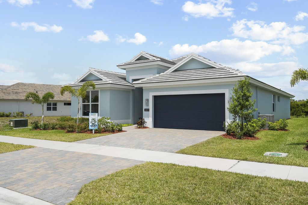 Photo of 12471 SW Sunrise Lake Terrace, Port Saint Lucie, FL 34987 (MLS # R11131363)
