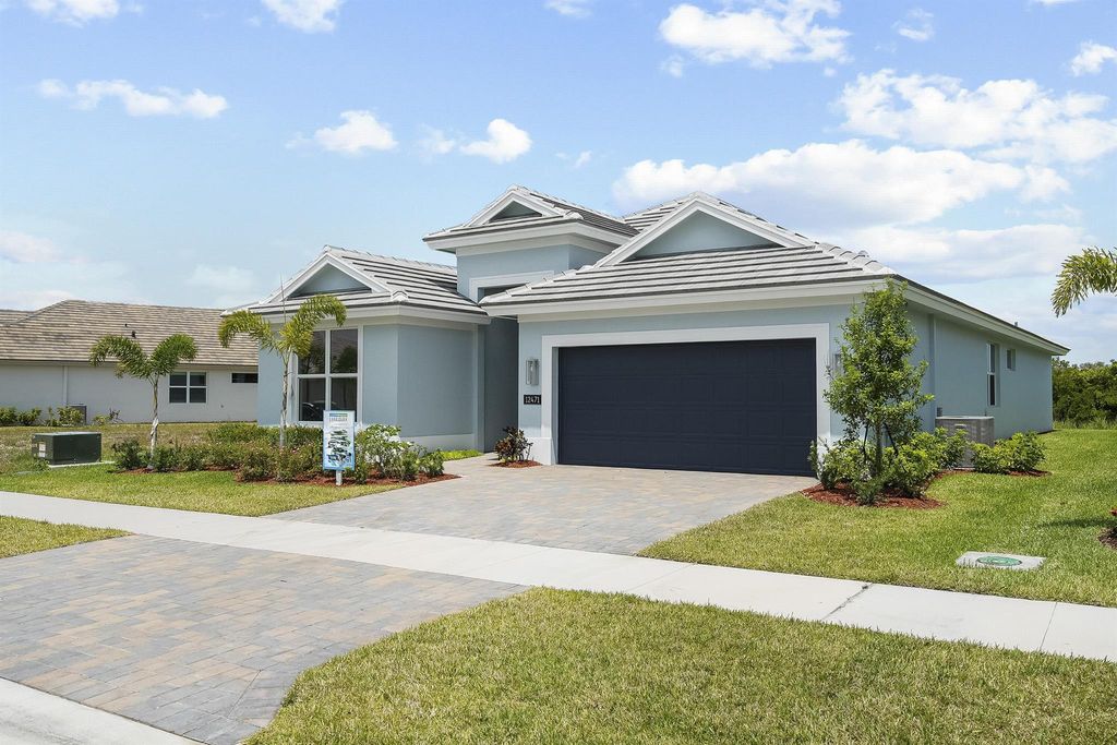 Photo of 12471 SW Sunrise Lake Terrace, Port Saint Lucie, FL 34987 (MLS # R11131363)