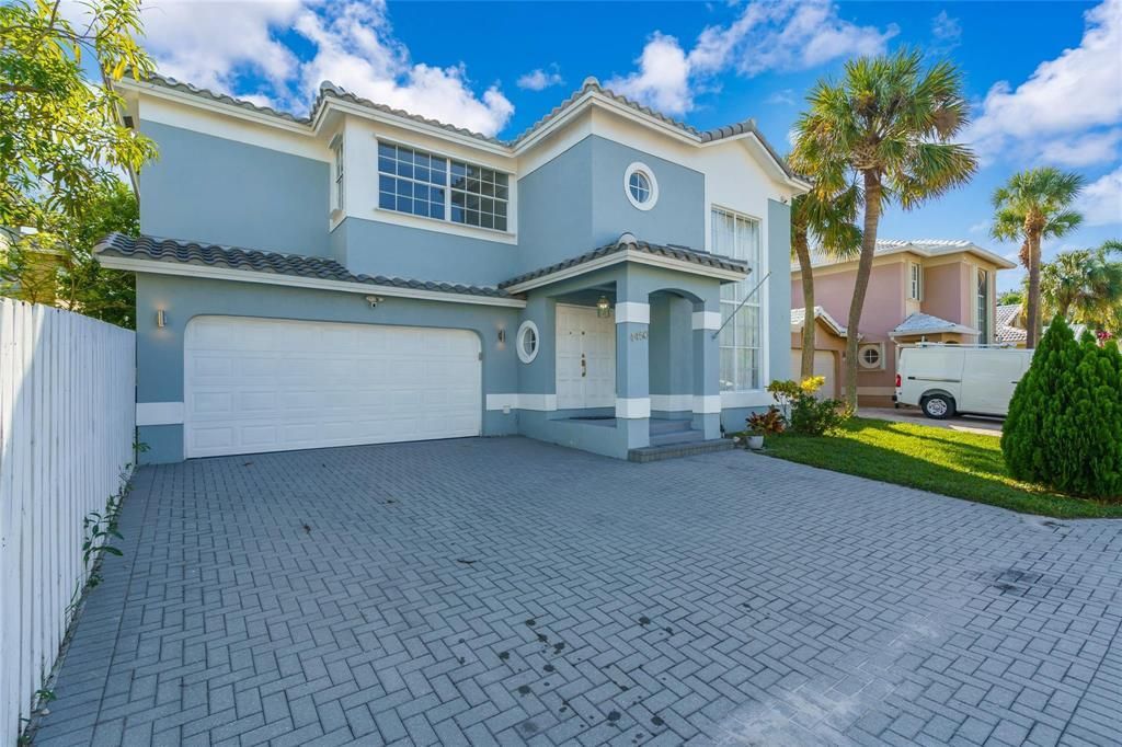 Photo of 4450 NW 55th Drive, Coconut Creek, FL 33073 (MLS # B26005463)
