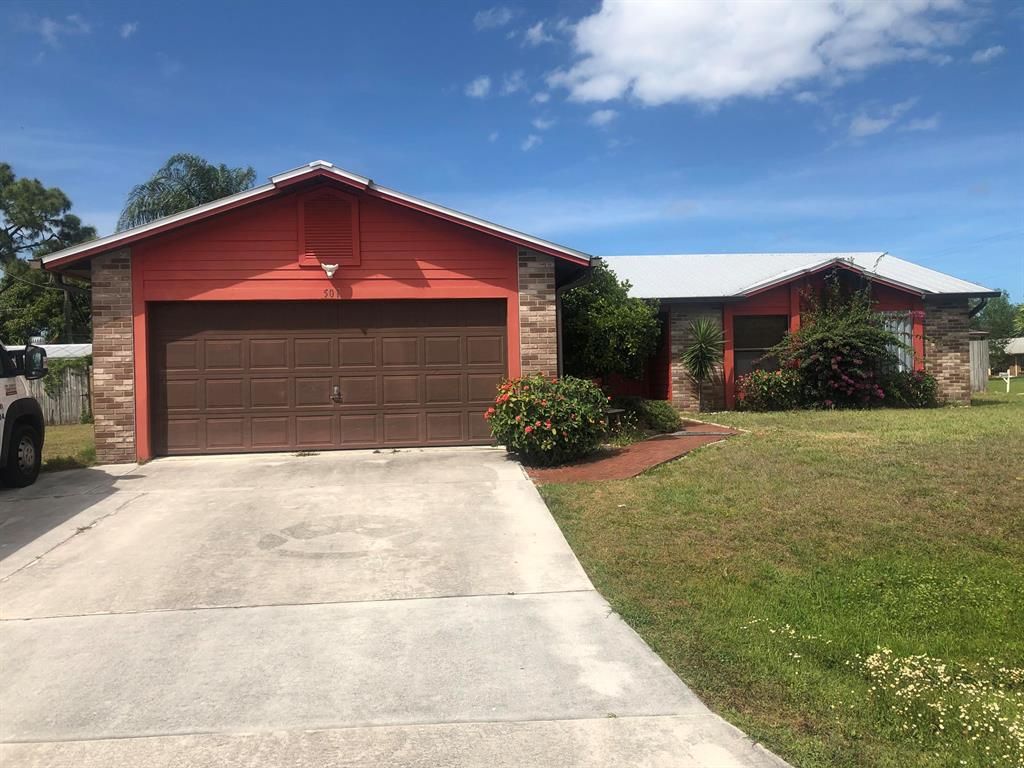 Photo of 501 SW Violet Avenue, Port Saint Lucie, FL 34983 (MLS # R10703698)