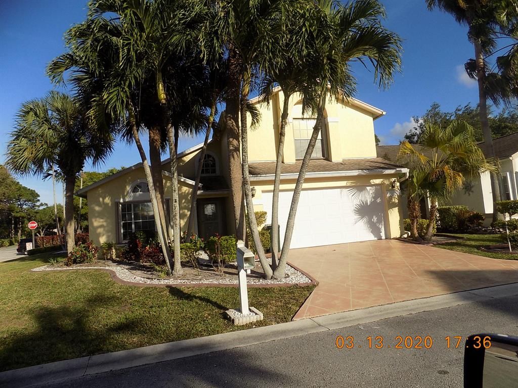 Photo of 119 Hammocks Drive Dr, Green Acres, FL 33413 (MLS # R10610073)