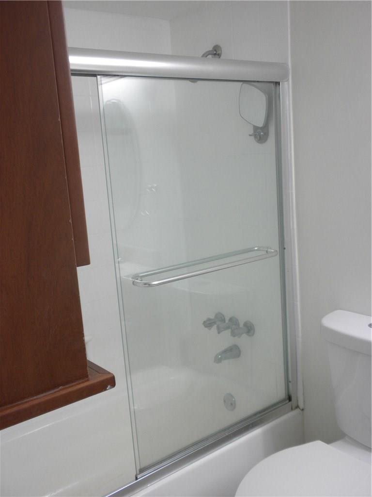 Woodside Apts Condo - Residential Lease