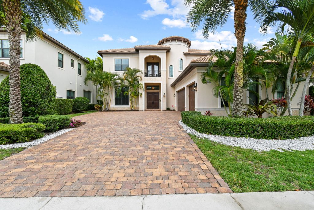 Photo of 145 Gardenia Isle Drive, Palm Beach Gardens, FL 33418 (MLS # R10979150)