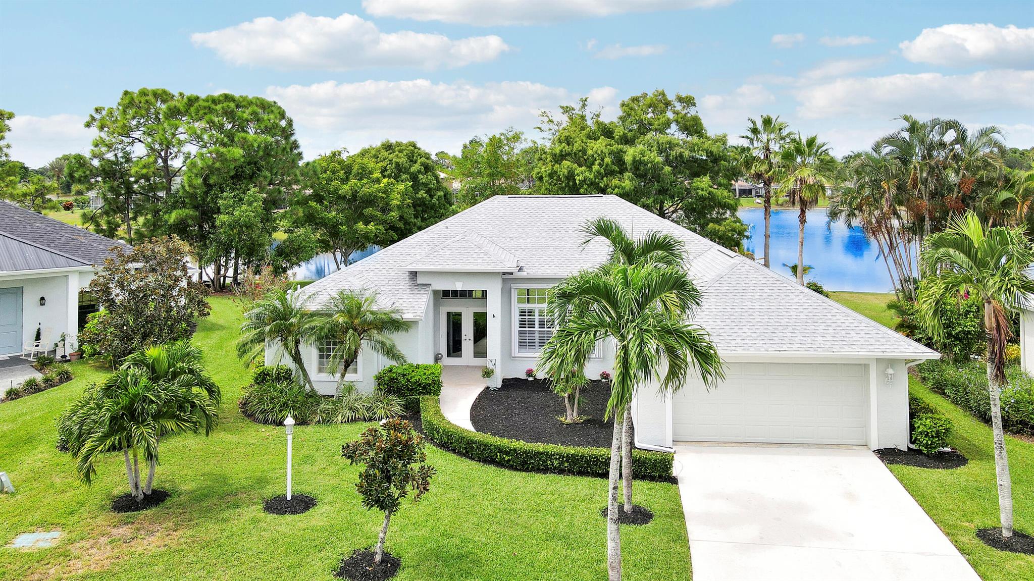 This gorgeous 4bdr/2bath cul-de-sac home with high vaulted ceilings, fantastic layout, and breathtaking 180 views of the private lakefront is nestled in the highly desirable secure and serene gated Crane Point community of Sawgrass Lakes! A spacious kitchen enjoys a double oven, tons of counter space, and center island opening into the family room. Ceramic tile throughout all living areas and new LVP flooring in all bedrooms. The master bdrm has two walk-in closets, glass enclosed shower, soaking tub and two separate cabinet/sink areas and guest bedroom with waterfront views has a large walk-in closet as well. New roof, A/C, refrigerator, water heater, dish washer, and washer and dryer in past 3 years! A spacious rear screened porch comes with a summer kitchen and sink. Save money on