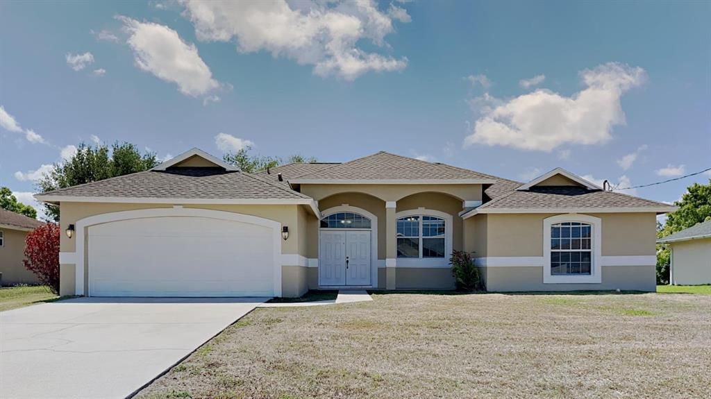 Photo of 2142 SW Algiers Avenue, Port Saint Lucie, FL 34953 (MLS # R10794980)
