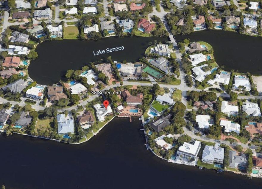 The one you have been waiting for! This incredible Sea Ranch Lakes property with 105 feet directly on the Intracoastal Waterway and over 15,400 square ft of land, is ready for your personal renovations or great opportunity to build your own. Impact windows in this double master suite home and a vaulted kitchen/great room has incredible views of the yachts passing by on the Intracoastal. This home sits back from the main waterway  which gives you more privacy yet gives you full views from every room in the house. Don't forget that security gated Sea Ranch comes with private beach access and the very best exclusive oceanfront clubhouse/pool/tennis court and playground with 200 feet of sandy beach. Sea Ranch also has its own police dept. Walk to restaurants, stores & Publix etc.