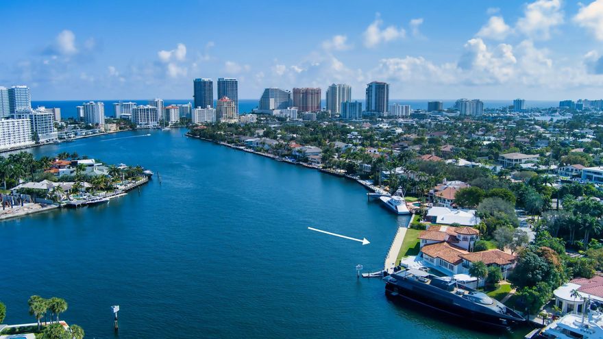 Perched on a prestigious point lot in the exclusive Seven Isles community, this waterfront sanctuary offers an unrivaled South Florida lifestyle. With 315 feet of deep-water frontage, a floating dock, and quick access to the Intracoastal, this property is a yachter’s paradise that easily accommodates two large yachts. Wake up to breathtaking sunrises, spend days paddleboarding or cruising the waterways, and unwind with panoramic views from nearly every room. Just minutes from Las Olas Boulevard, world-class dining, and pristine beaches, this estate is the perfect fusion of luxury and leisure—an invitation to embrace the ultimate waterfront experience.  Unparalleled waterfront living with a 142' North dock & 173' East dock, offering direct ocean access via Port Everglades. Endless views!