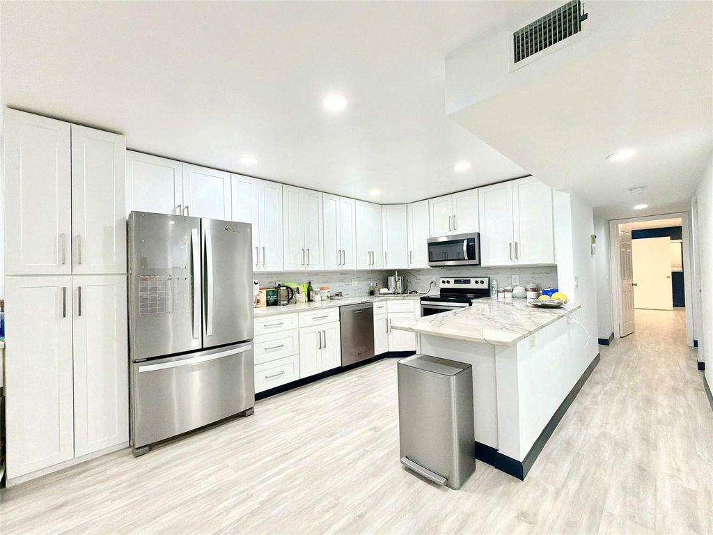 Photo of 13790 Oneida Drive #B1, Delray Beach, FL 33446 (MLS # F10555551)