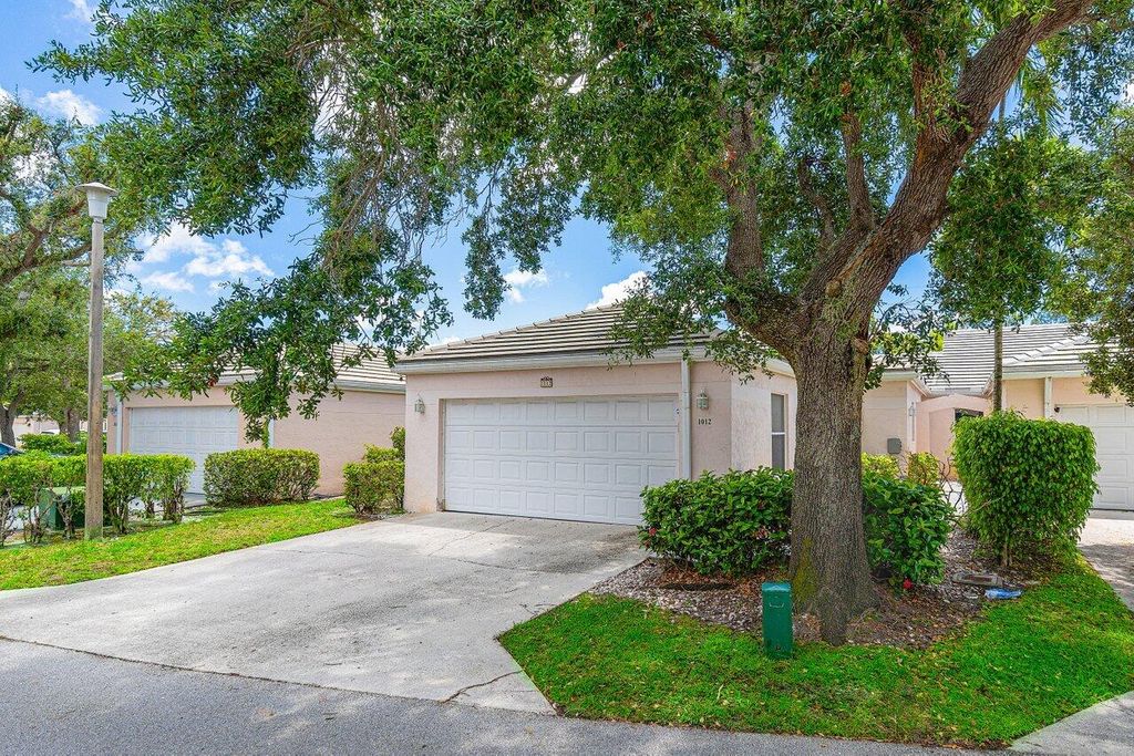 Photo of 1012 Island Manor Drive, Greenacres, FL 33413 (MLS # R10994613)