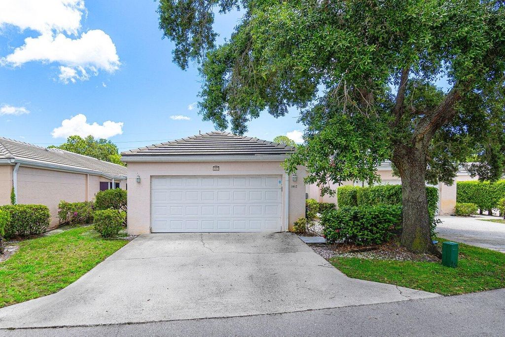 Photo of 1012 Island Manor Drive, Greenacres, FL 33413 (MLS # R10994613)