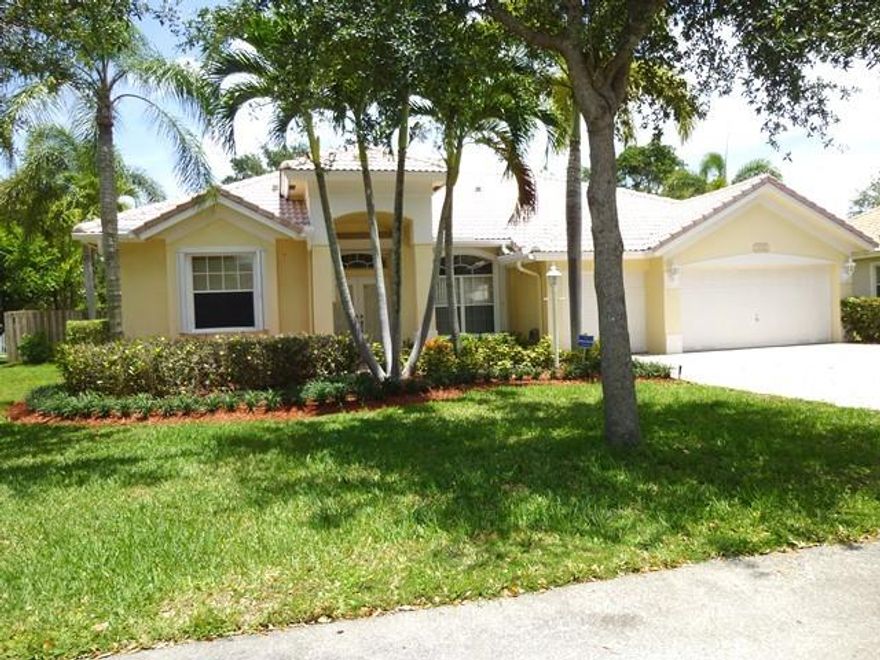 New photos coming soon. Great 3 BR 2 Bath with 3 car garage on oversized lot. Similar to the Yale model, with  3 Bedrooms instead of 4. New paint & carpet, newer AC, refrigerator, super clean condition.  Split layout, big living areas, covered patio, huge 11,861 SF lot with no neighbors behind. Great community, all lots are a minimum of 90 feet wide. This was a former model & sales office for the community. Garage is vented for AC and has insulated doors.
