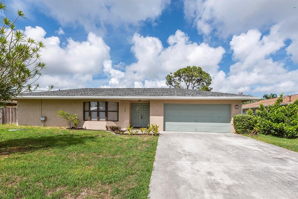 Photo of 1168 SE Clifton Lane, Port Saint Lucie, FL 34983 (MLS # R10722800)
