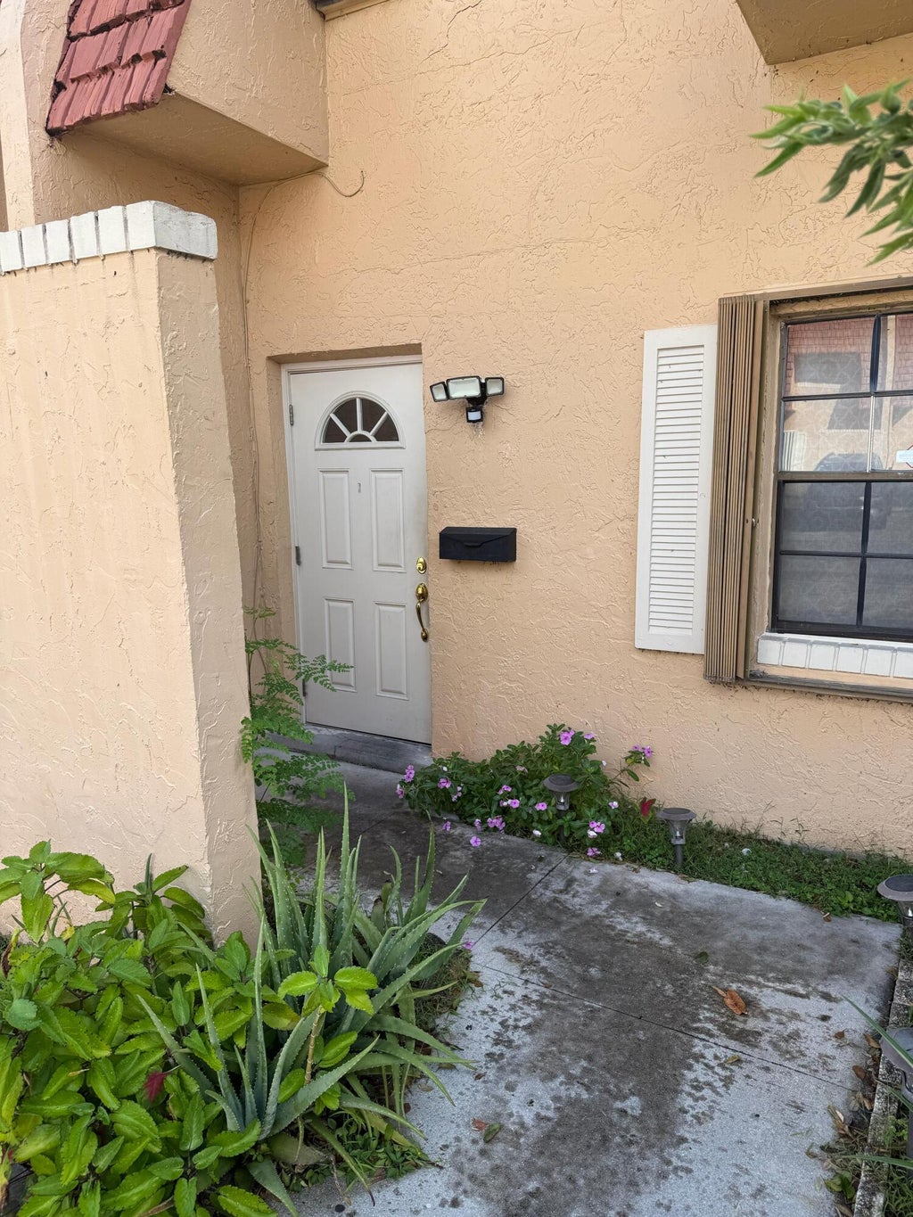 Photo of 76 Ann Lee Lane, Tamarac, FL 33319 (MLS # B26041367)
